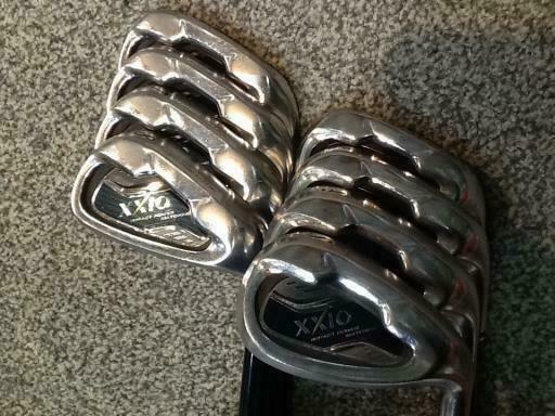 DUNLOP NEW XXIO 2010 9PC S-FLEX CAVITY BACK IRONS SET GOLF CLUBS